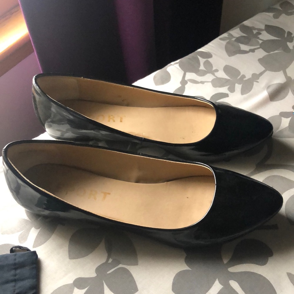 Lightly worn black patent flats